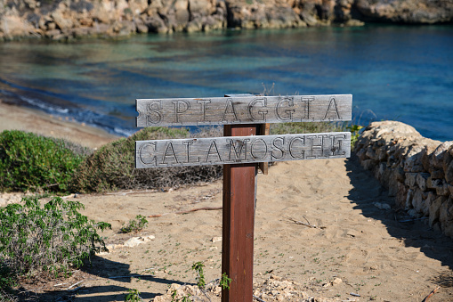 Calamosche wooden sign from the Sicilian vacation bay