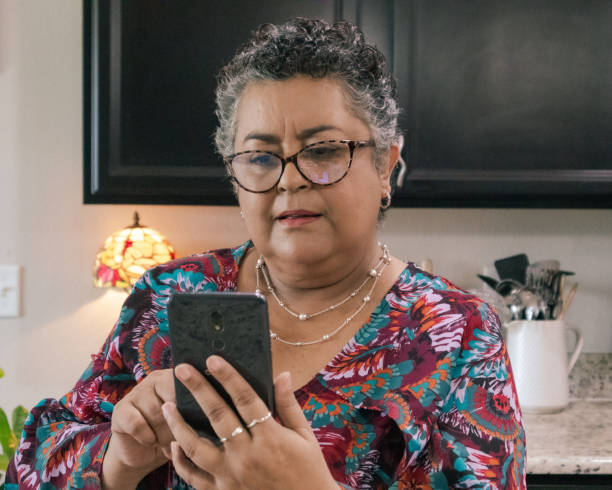istock Senior Woman scrolling social media or doing  internet search 1722787588