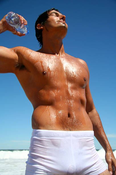 istock Sexy Man on the Beach 172279219