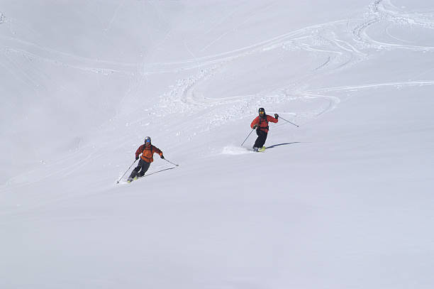 istock People in powder snow 172279322