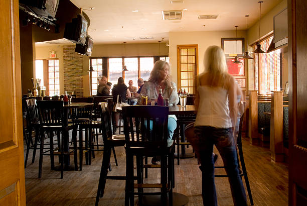 istock Women Standing Talking in a Pub During the Afternoon 172279490