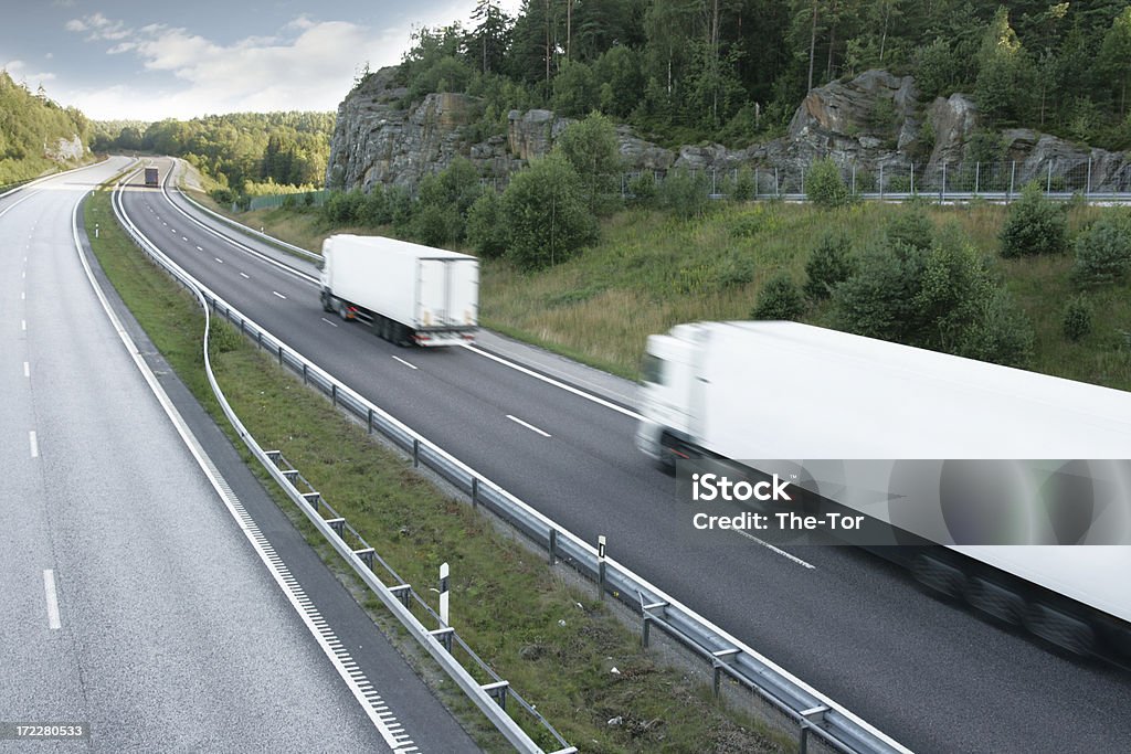 Convoy White Trucks in a convoy. Truck Stock Photo
