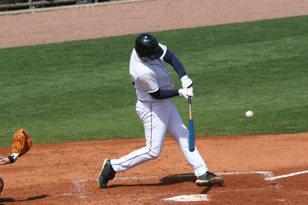Hitter a baseball player hitting a ball home run photos stock pictures, royalty-free photos & images