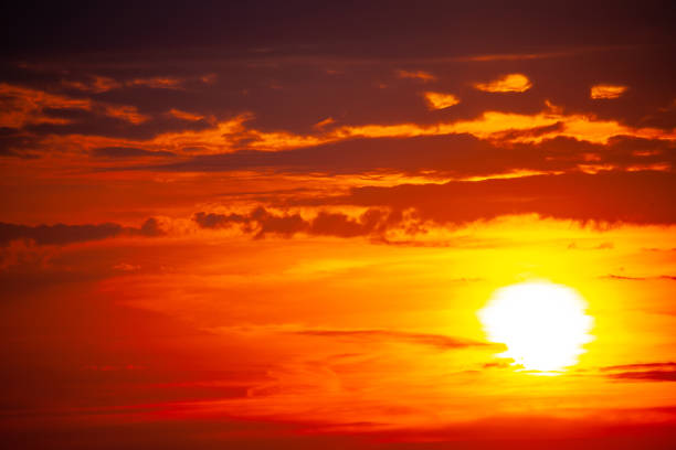 istock Bright orange sunset with dark clouds on the sky 1722809743
