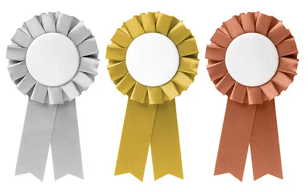 Photo of Three ribbon awards in silver, gold, and bronze