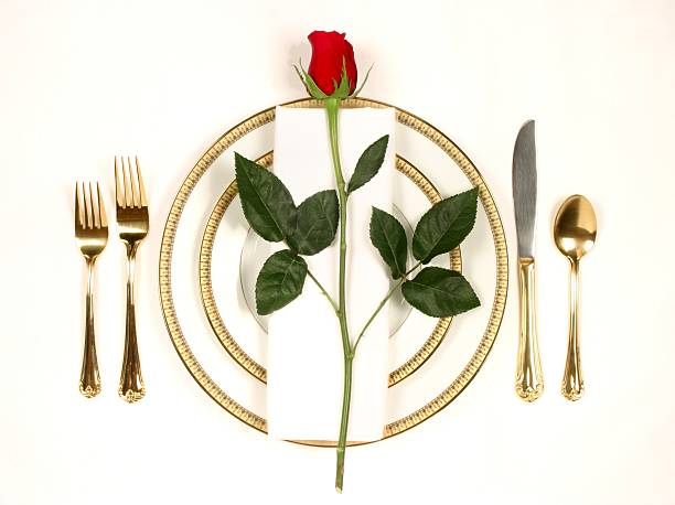istock Elegant Table Setting 5 with white and gold plates and rose 172281477