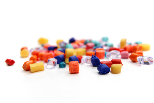 Image of different sized and colored plastic grains  stock photo