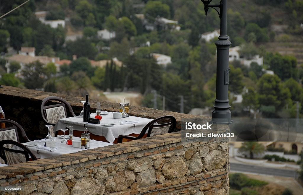 Best Table in the House "Table set for a romantic dinner on the terrace of a restaurant near Torremolinos, Spain, in Andalusia. Need photos from Spain" Gourmet Stock Photo