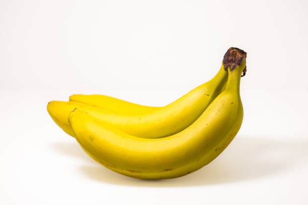 Close-up of a partially peeled banana, revealing its soft and edible interior