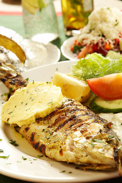 istock Sauteed Trout with herb butter 172282516