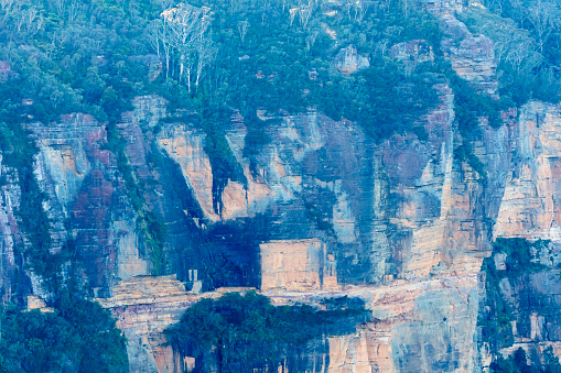 Photograph of a rugged and rocky mountain cliff face near Katoomba in the Blue Mountains in New South Wales in Australia