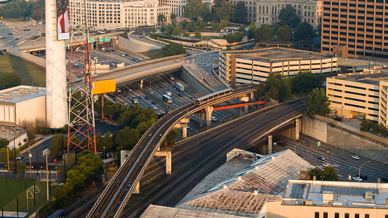 Train approaching Atlanta, GA Downtown: King Memorial station traffic in wakening city