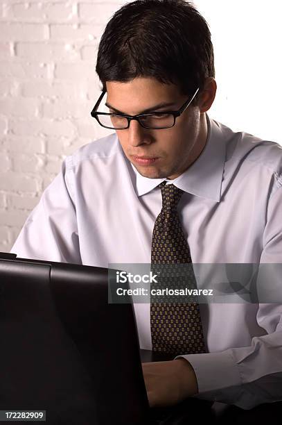 Young Businessman Working Stock Photo - Download Image Now - Adult, Adults Only, Brick Wall