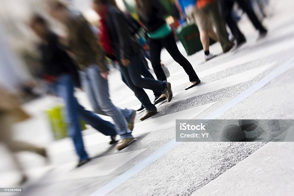 Walking "People on a shopping street crossing, taken with lens baby" Blurred Motion Stock Photo