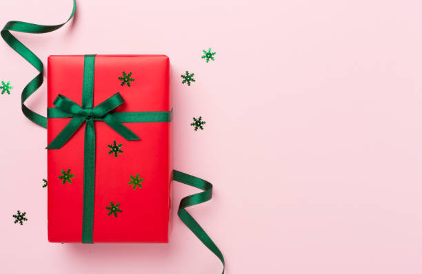 istock Creative handmade christmas gift box with decor on concrete background, top view 1722839918