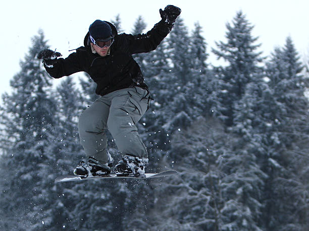 Snow Boarder Catching Air 2 stock photo