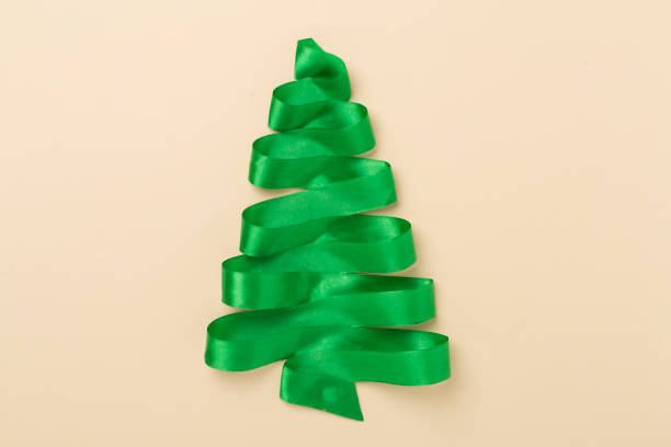 Creative handmade christmas tree on color background, top, view