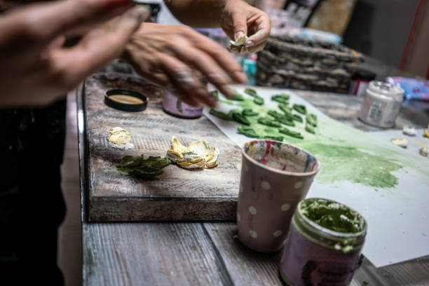 women hands are preparing handcraft in studio close up horizontal still