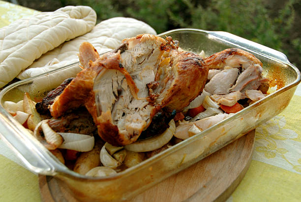 Chicken bones & dinner eaten leftovers on outdoor dining table. (SEE LIGHTBOXES BELOW for more healthy meals & holiday food photos...)