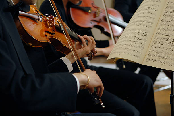 istock Violinists play in an orchestra 172285906