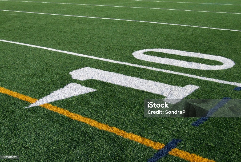 Bright 10 Yard Line Diagonal of 10 yard line.  See my many other sports backgrounds.See my other sports (shots American Football Field Stock Photo