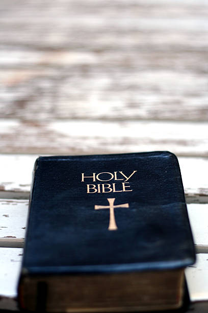 Bible on White Table stock photo