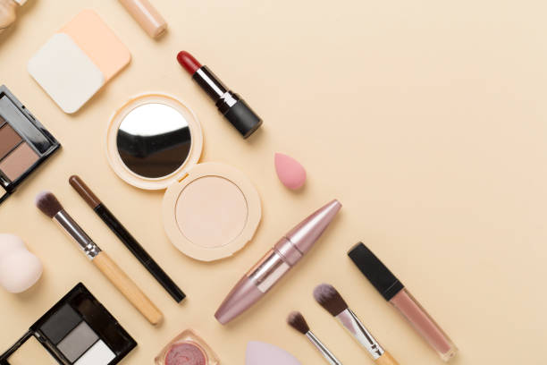 istock Flat lay with makeup products and tools on color background 1722865557