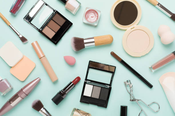 istock Flat lay with makeup products and tools on color background 1722865558