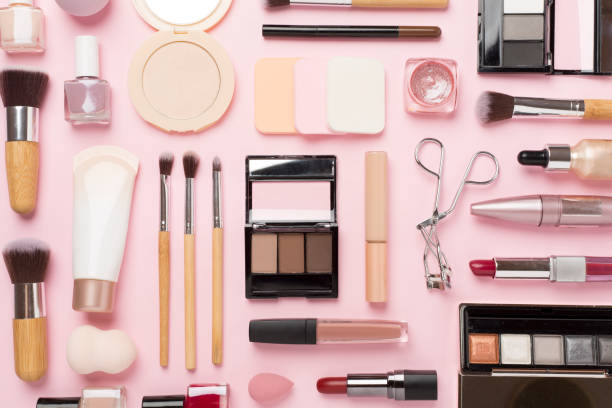 istock Flat lay with makeup products and tools on color background 1722865561