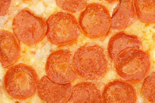 Studio shot, macro, texture of fresh pizza surface