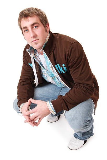 istock Casual Crouching Male - straight face 172286931