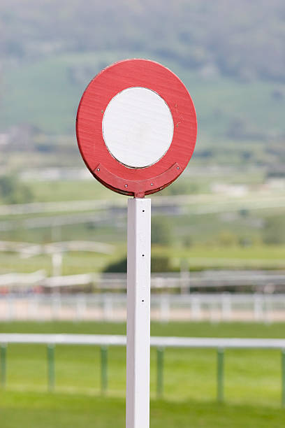 Finishing post 2 A close-up view of a finishing post from a UK horse race track with the track out of focus in the background. Adobe RGB 1998 profile.Racecouses and finishing posts pole photos stock pictures, royalty-free photos & images