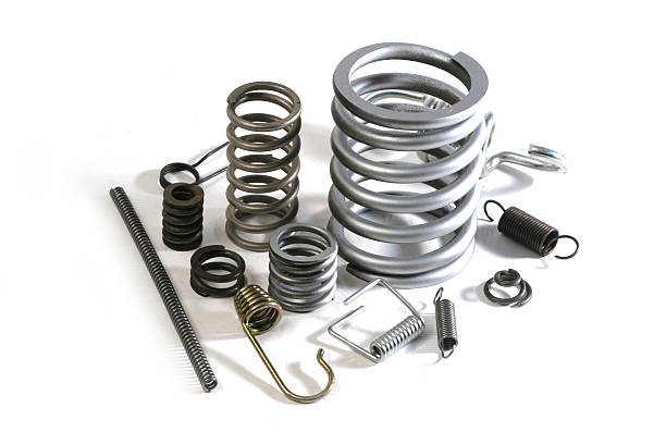 springs group of metal springs. coiled spring stock pictures, royalty-free photos & images