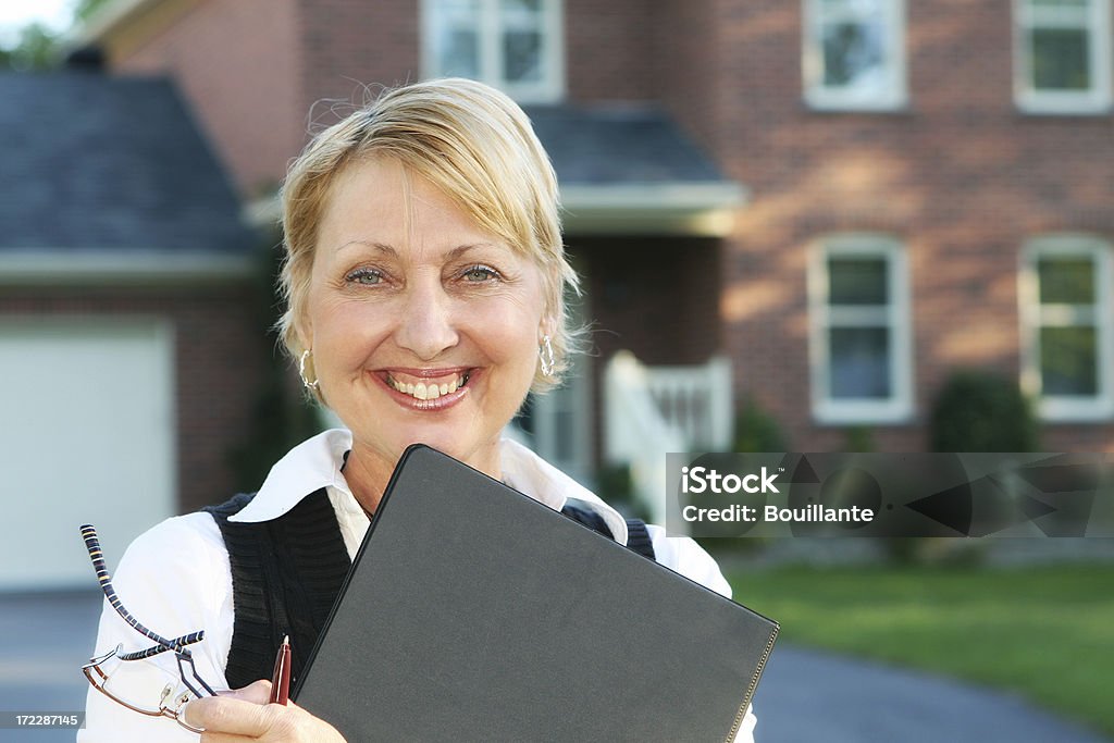 Smiling agent  50-59 Years Stock Photo