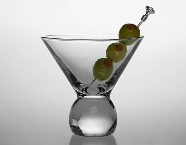 Cocktail Glass with Olives stock photo