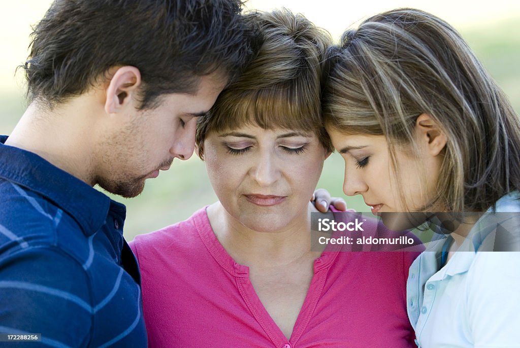 Family praying Family praying together Affectionate Stock Photo
