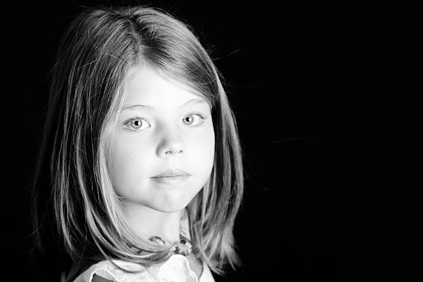 istock Young girl looking at camera 172288619