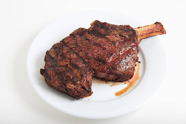 gegrillte cowboy-ribeye - 4 - steak meat strip steak restaurant stock-fotos und bilder