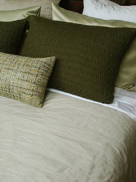 istock Green Pillows on a Luscious Bed 172289856