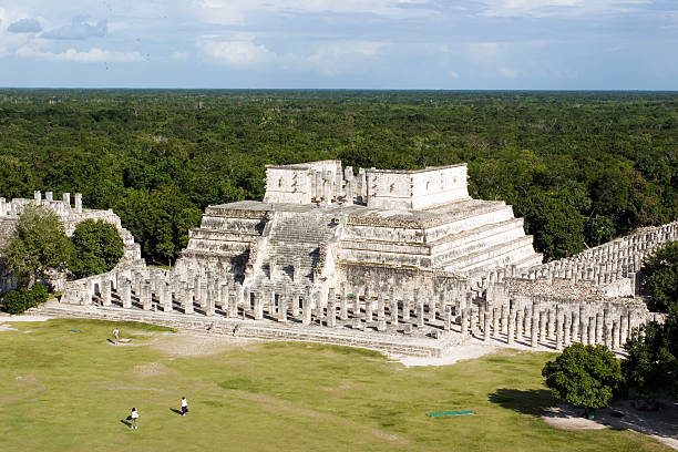 Pyramids of Chichen Itza from the Great Pyramid stock photo