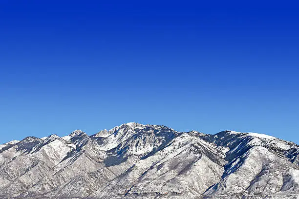 Wasatch mountain in saltlake county with a beautiful blue sky.
