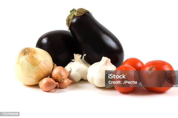 Fresh Whole Vegetable Arrangement Eggplant Tomatoes Onion Garlic Shallots Stock Photo - Download Image Now