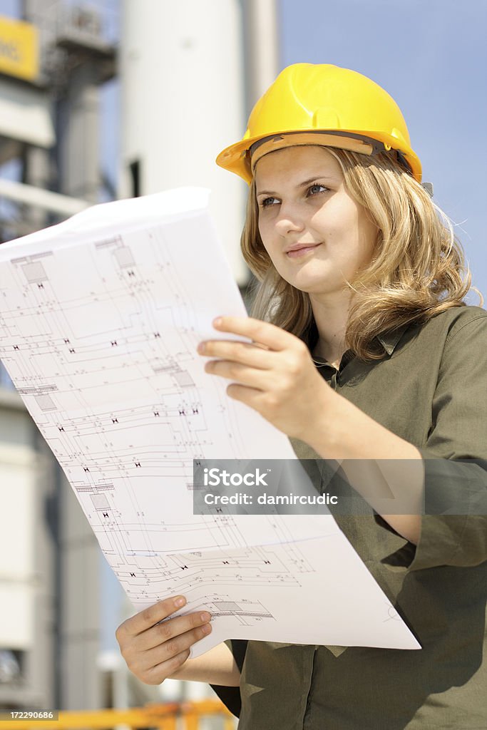 Joven atractiva mujer Ingeniero - Foto de stock de Accesorio de cabeza libre de derechos