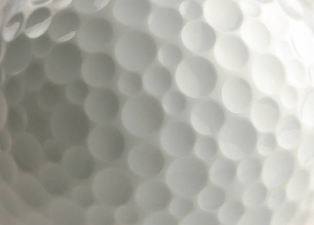 primer plano de pelota de golf - golf abstract ball sport fotografías e imágenes de stock