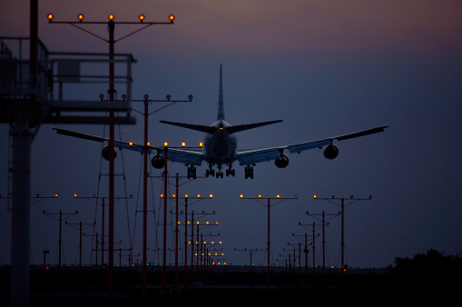 An airplane landing at Los Angeles International Airport