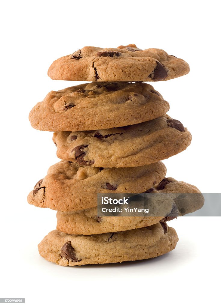 Homemade Chocolate Chip Cookies Tower Stack Isolated on White Background Fresh, homemade chocolate chip cookies stacked in vertical tower of six morsels. The pile zig zags for balance. The baked, gourmet dark chocolate treat is a favorite dessert or after-school snack with milk. The sweet food indulgence contributes to overeating fats and sugars, an unhealthy diet. Isolated on white background. Chocolate Chip Cookie Stock Photo