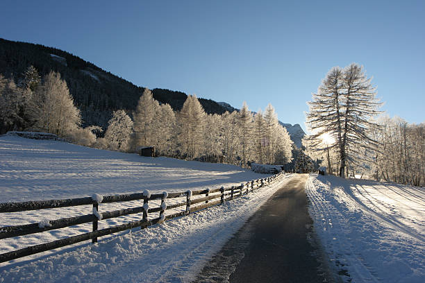 road to the  winter sun stock photo