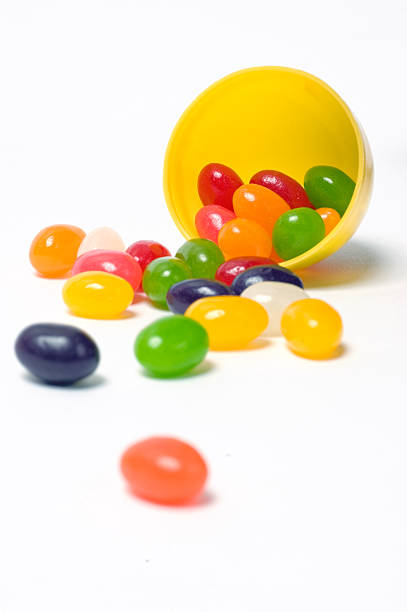 Jelly Beans in a Plastic Egg stock photo