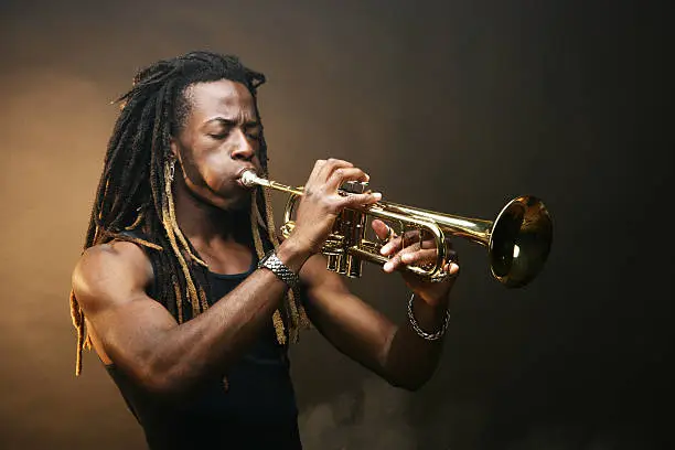 Young man playing trumpet http://www.lisegagne.com/images/casual.jpg
