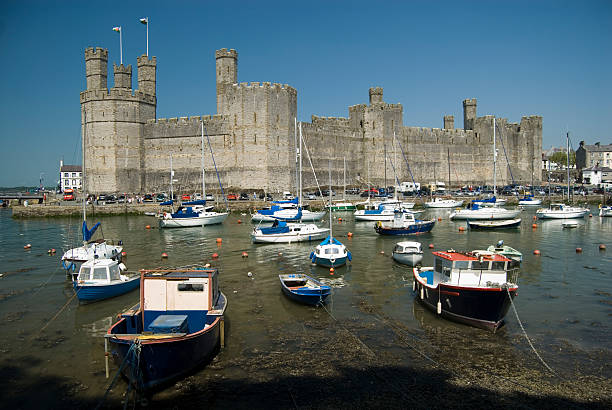 istock Carnarvon Castle and Harbour in Wales UK 172295799